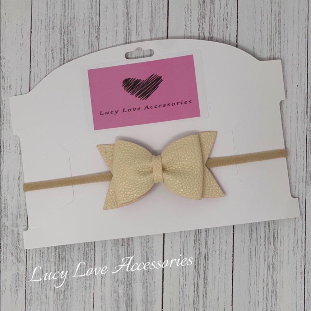 Handmade cream colored bow headband!